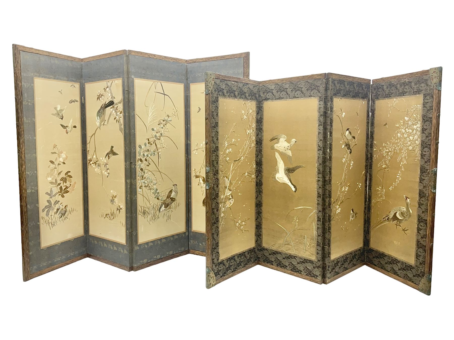 Two Oriental silk and wooden screens embroidered with birds and blossoming branches, largest H88cm 