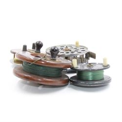 D. Slater, Newark, wood, alloy and brass star-back centre pin reel,  together with three other wooden/alloy reels including Edge Elite, Milbro Pelican and one other 