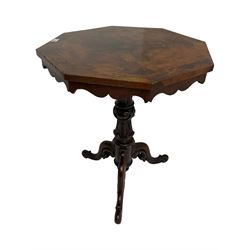 Victorian figured mahogany tripod table, octagonal top with segmented highly figured veneers over pointed arch frieze rails, on turned egg and dart carved pedestal with lappet carved baluster, three splayed and C-scroll carved supports with scrolled terminals