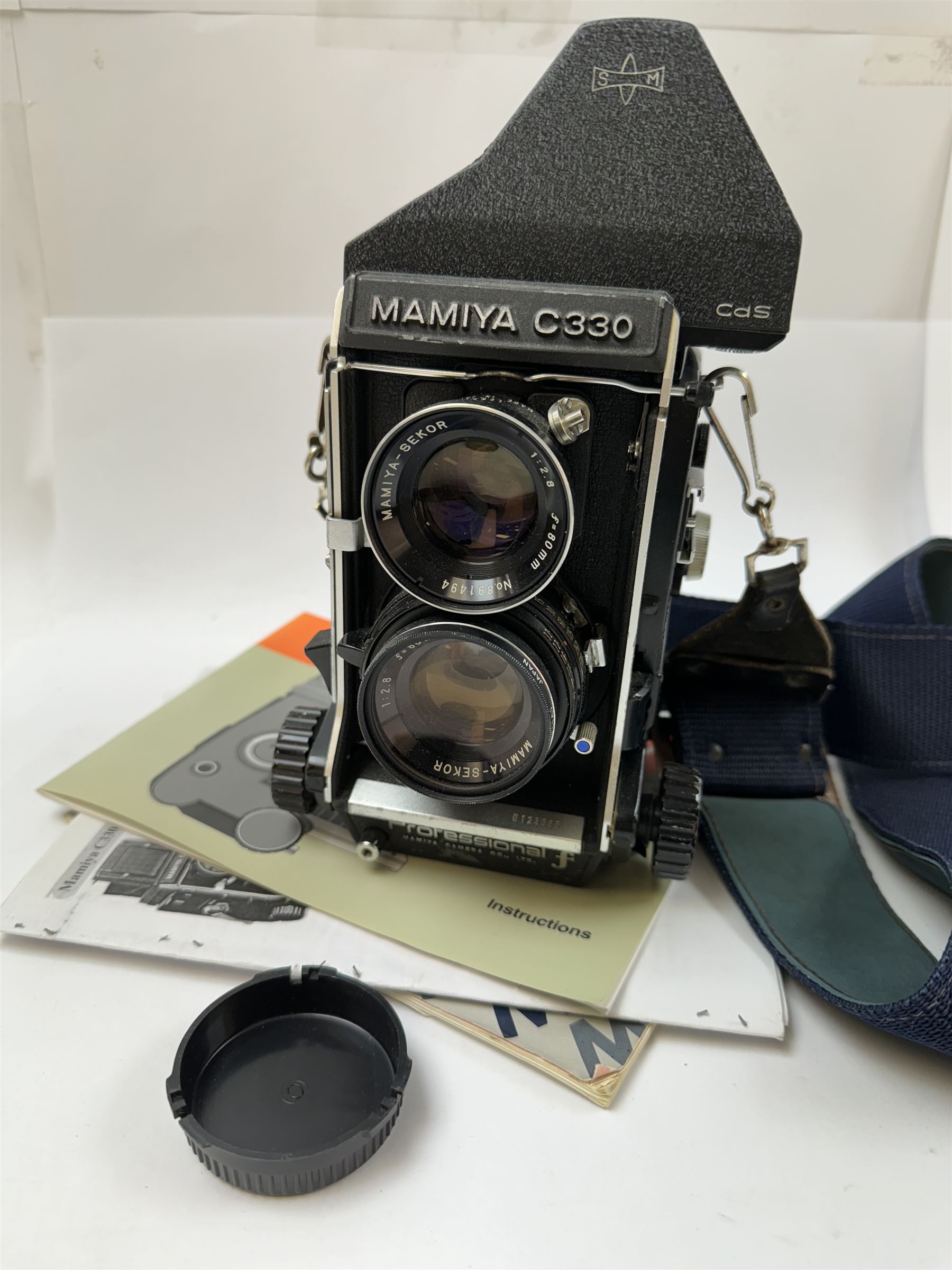 Mamiya C330 Professional F TLR camera, circa 1970s, serial no. D123535, with twin Mayima-Sekor 1:2.8 f=80mm lenses, serial nos. 891494 & 891276, with a Mayima C porrofinder