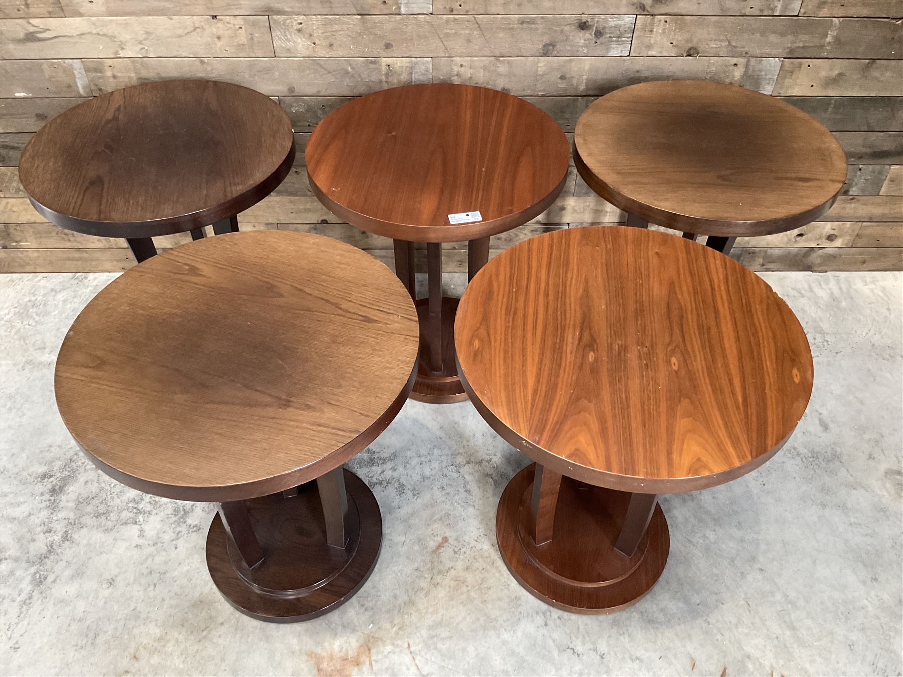 Five walnut circular bar or bedroom occasional tables