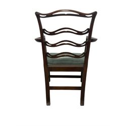 Set of twelve (10+2) Chippendale revival stained beech dining chairs, pierced waived ladder backs with over-stuffed over seats, on square moulded supports joined by stretchers