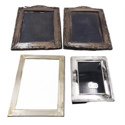 Four silver mounted photograph frames, comprising pair of early 20th century examples, and two smaller modern examples, all hallmarked, tallest H19cm