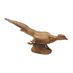  'Mouseman' Oak Pheasant, in a running pose with carved mouse signature by Robert Thompson of Kilburn, L47cm x H26cm  