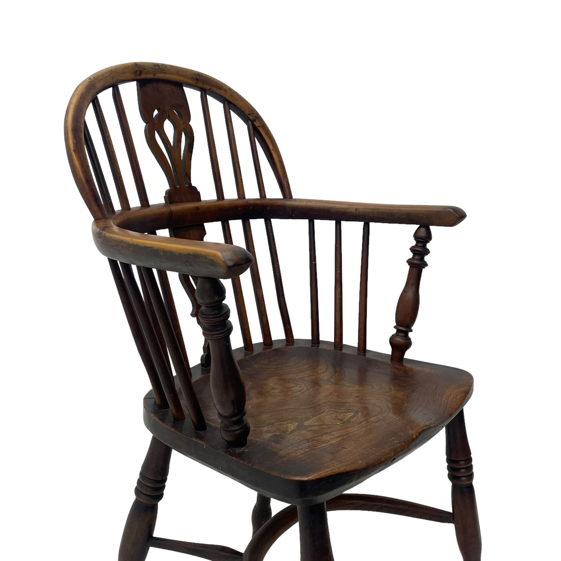 19th century yew wood and elm Windsor armchair, low double hoop stick and pierced splat back, dished seat on turned supports united by crinoline stretchers