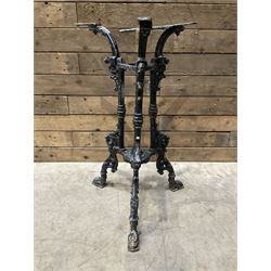 19th century cast iron table base, trefoil column with paw feet