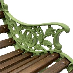 20th century cast iron and wood slatted 'Lilly of the Valley' garden bench, cast iron bench ends of scrolled form decorated with trailing foliage and flower heads, on scrolled supports 