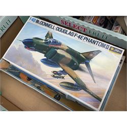 Twelve scale model kits, comprising ten model aircraft kits from Hasegawa, Nichimo, Fujimi and Matchbox, and two further Hasegawa 1:8 scale aircraft mounted machine gun kits, in two boxes 