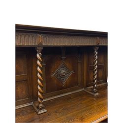 Jacobean Revival oak dresser, projecting moulded cornice over arcade carved frieze and panelled back, on spiral turned supports, moulded rectangular top over two cupboards and two drawers, on spiral turned supports united by moulded stretchers 