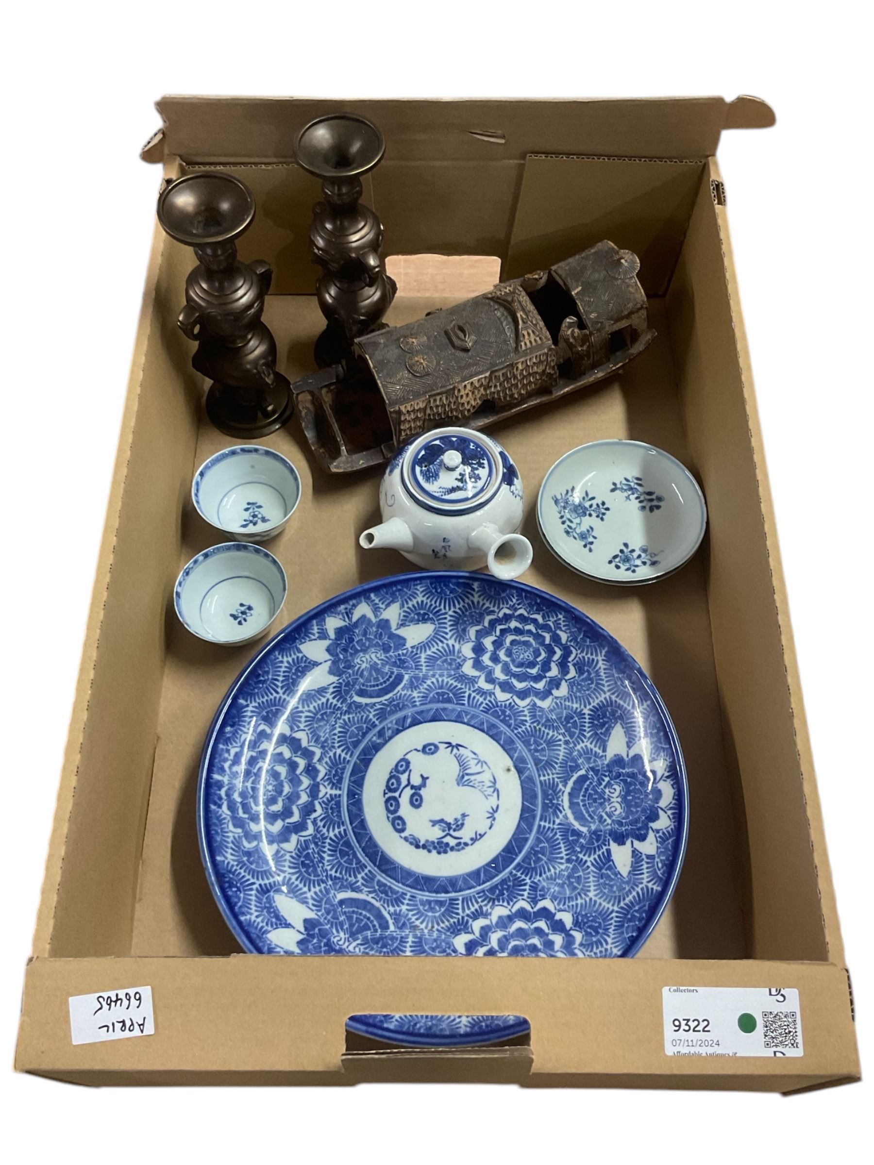 Pair of Japanese blue and white plates decorated with flowers, D29cm, pair of Chinese tea bowls and saucers, pair of Japanese Bronzed candlesticks, Chinese bamboo model of a Junk (8)