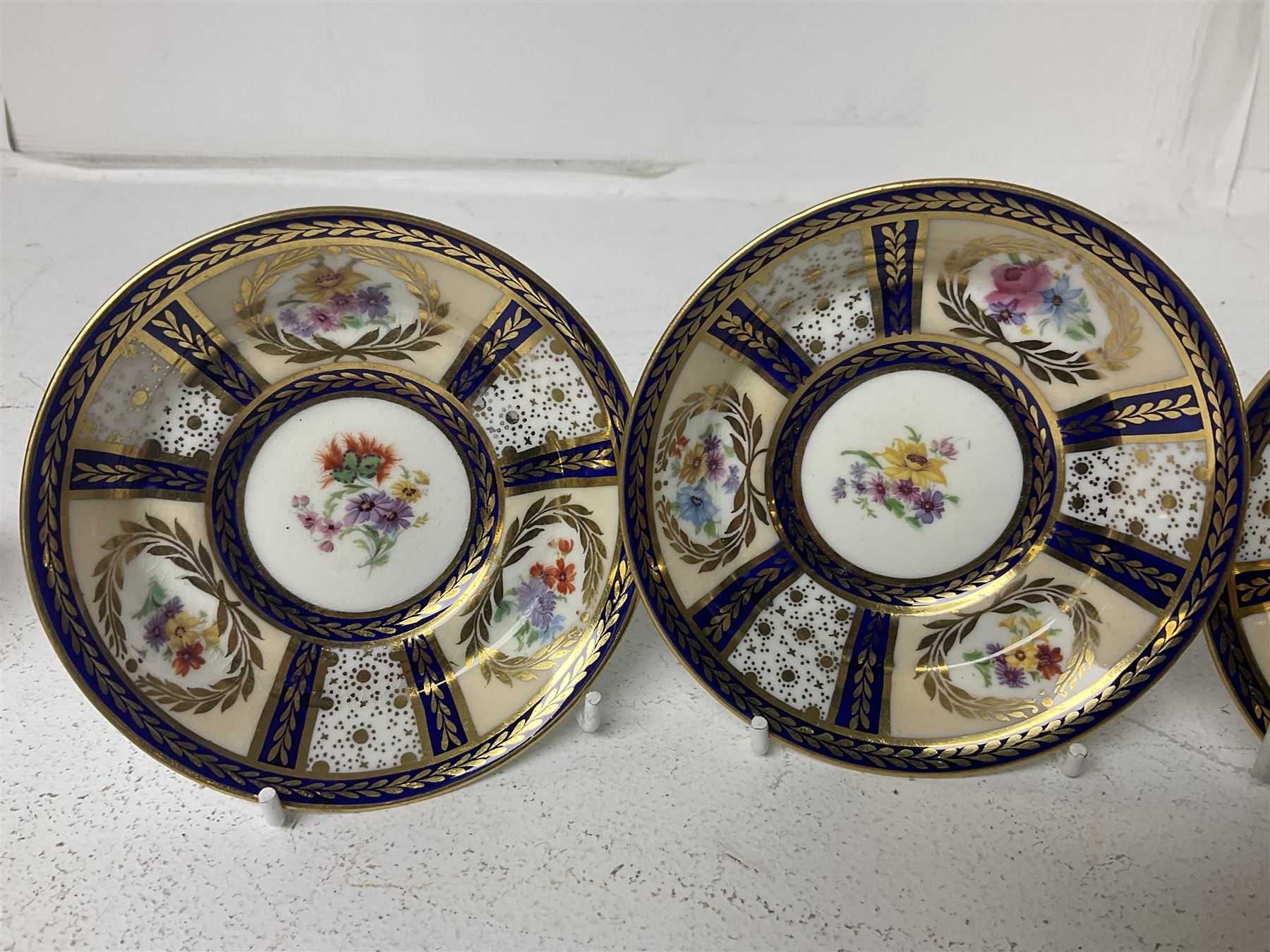 Paragon thee coffee cans and saucers, painted in gilt and colours with flowers, Paragon set of six coffee cups and saucers, 'Reproduction of Service accepted by Her Majesty Queen on her visit to the potteries, with three matching saucers