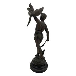 19th century French spelter figure 'Chasseur D'Aigles' on wooden base H48cm and a beaten copper circular tray inscribed with initials D61cm