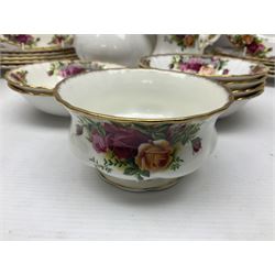 Royal Albert Old Country Roses pattern coffee set for four, comprising coffee pot, milk jug, cups and saucers, cake plate, together with six dinner plates, side plates etc (34) 