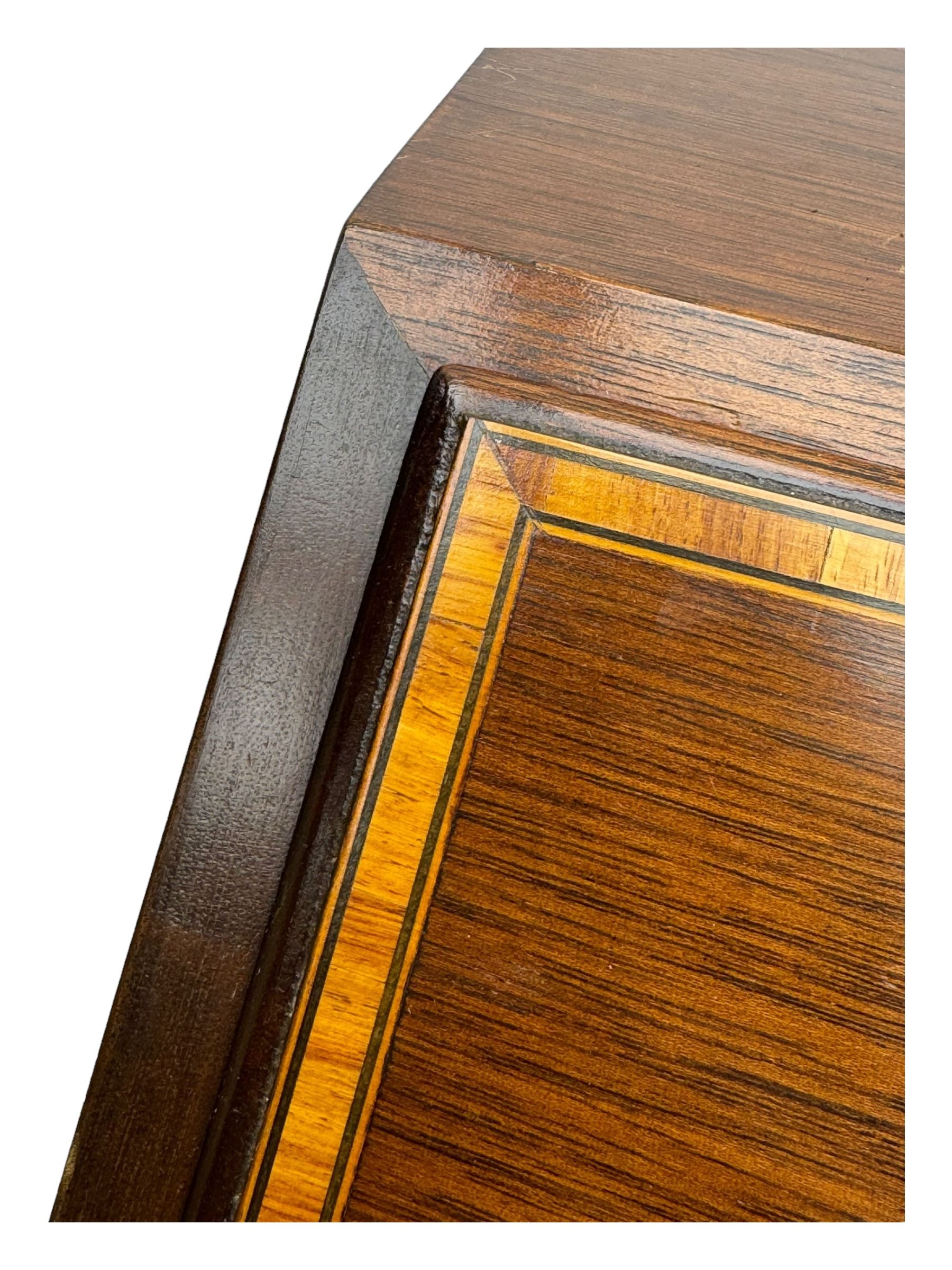 Mid-to-late 20th century inlaid mahogany bureau, inlaid floral medallion to the top, the fall front opening to reveal fitted interior with pigeonholes, small drawers and central cupboard, green inset writing surface with gilt tooling, four drawers below with brass handles, raised on shaped bracket feet