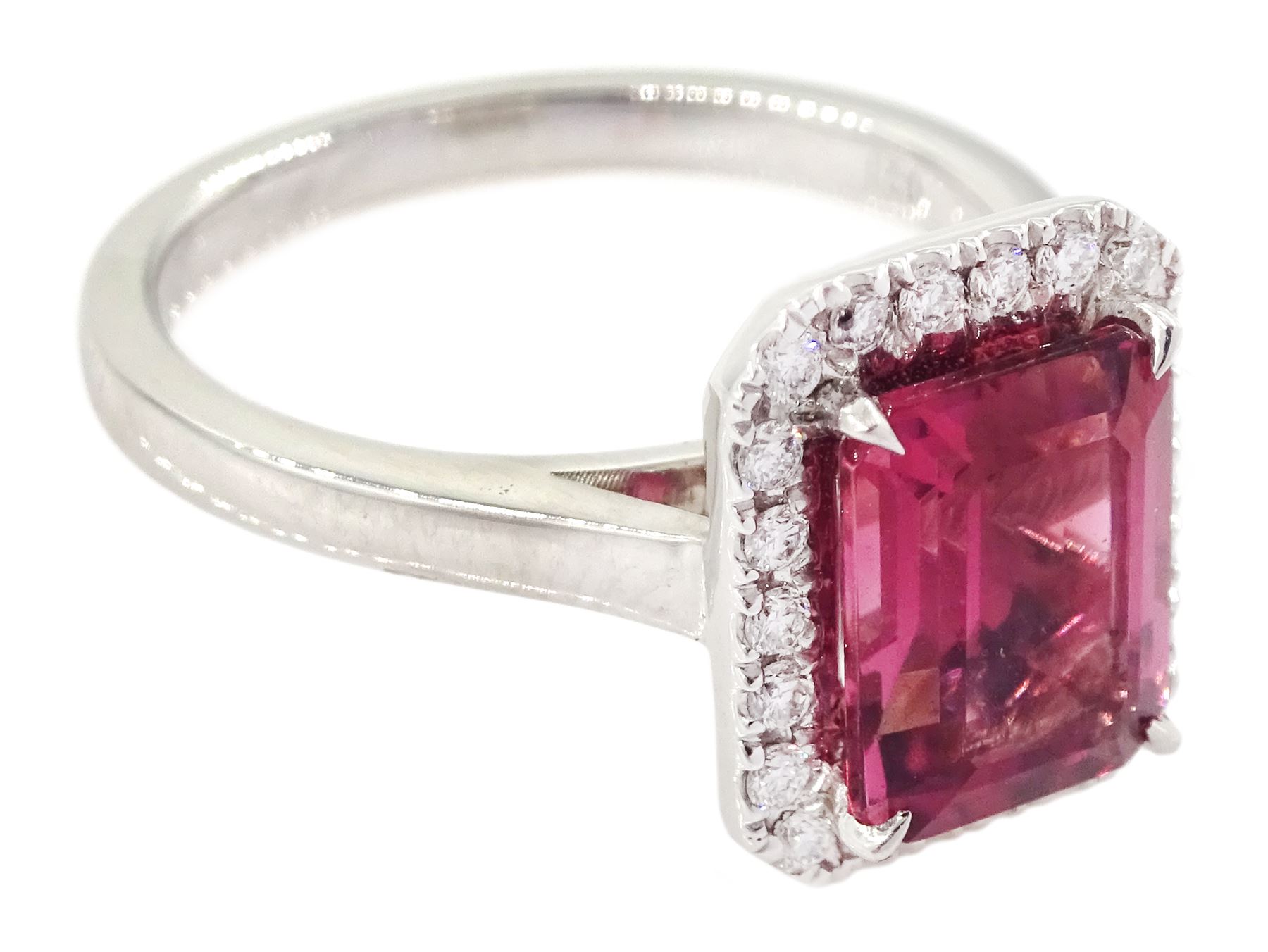 18ct white gold emerald cut tourmaline and round brilliant cut diamond cluster ring, hallmarked, tourmaline approx 2.45, total diamond weight approx 0.20 carat