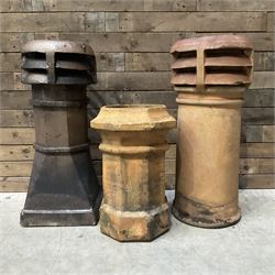 Three early to mid 20th century chimney pots