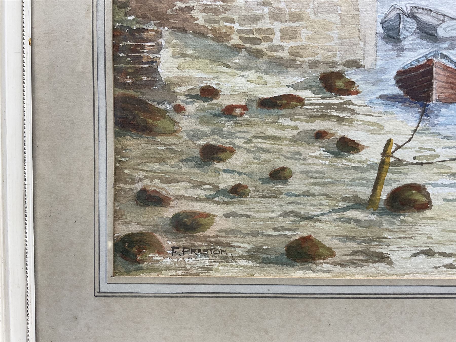 F Preston (British 20th Century): 'Staithes - The Beck', watercolour signed, titled and dated 1977 verso 17cm x 37cm; Roy Williams (British 20th Century): 'Robin Hood's Bay', charcoal signed and dated '92, 21cm x 30cm; together with a watercolour of barges signed 'Turner' (3)