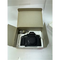 Canon F-1 SLR camera body serial no. 300461, boxed, together with thirteen Canon camera lenses, mostly FD, including 300mm 1:4 serial no. 18864, 100-300mm 1:5.6 serial no. 24187 and 200mm 1:2.8 serial no 16443, and three boxed FD extension tubes, some boxed