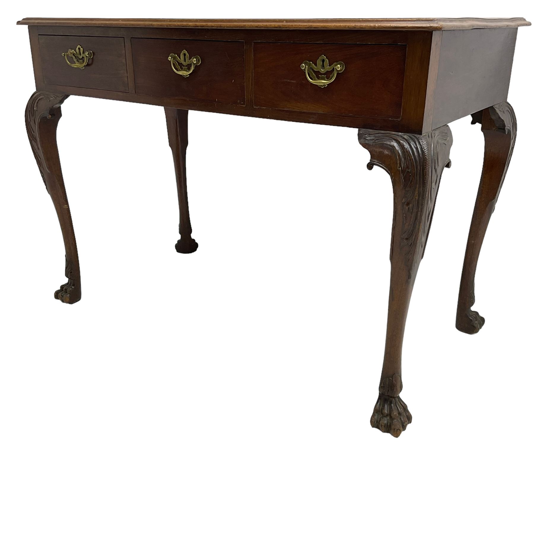 Late 19th century mahogany side table, moulded rectangular top over three drawers, pierced brass handle plates with swan neck handles, on acanthus carved cabriole supports with paw carved feet