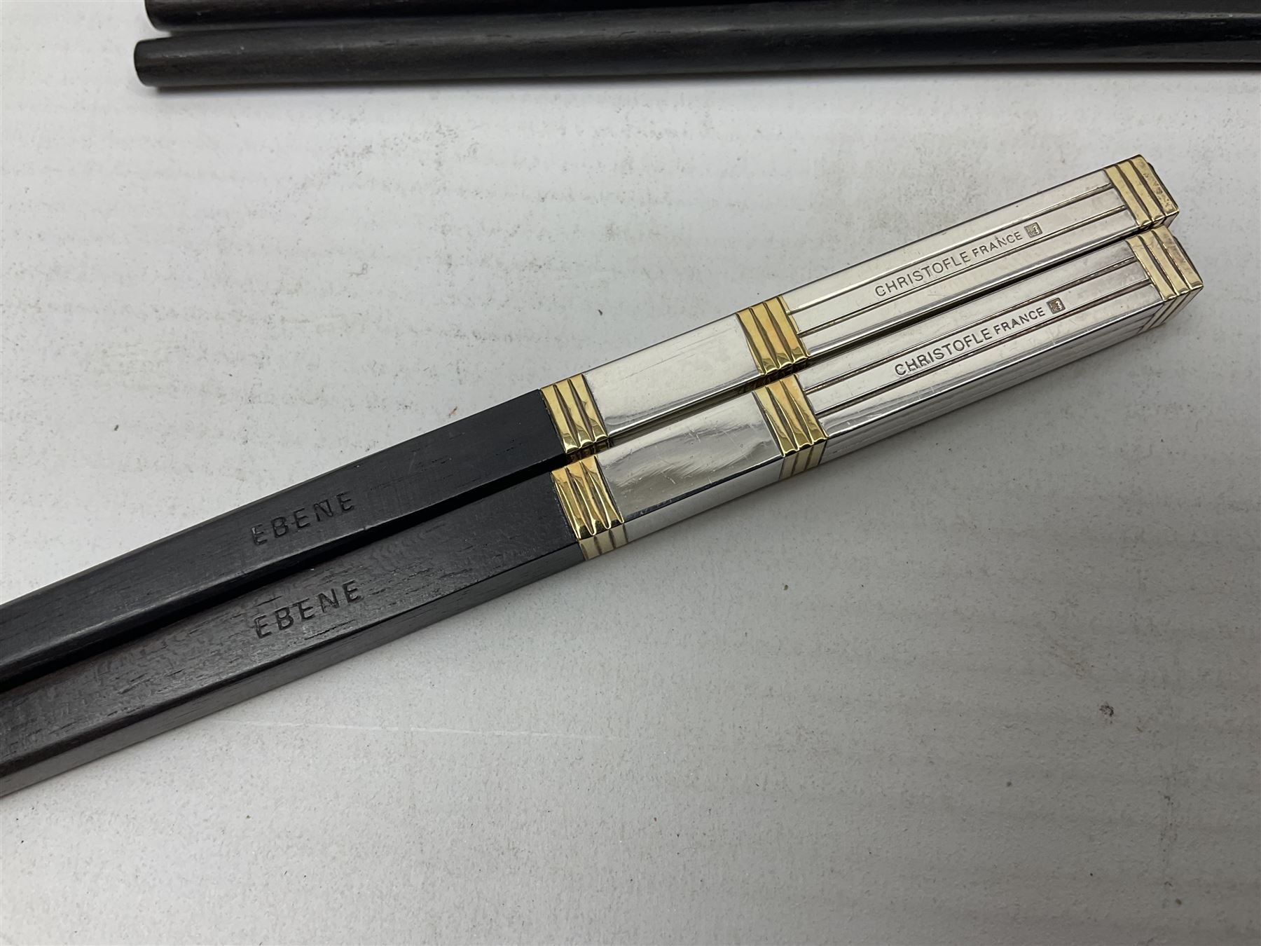 Set of eight silver plated ebony chopsticks by Christofle France, in presentation case