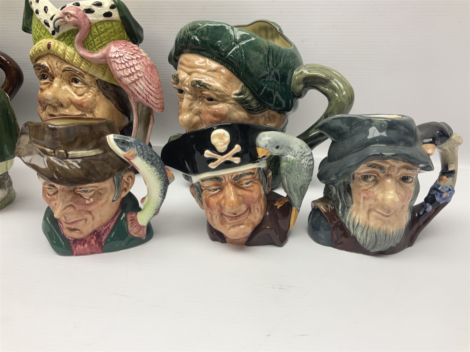 Twenty two Royal Doulton toby and character jugs, including Ugly Duchess D6599, Old Salt D6551, The Walrus & Carpenter D6600, Robin Hood D6534