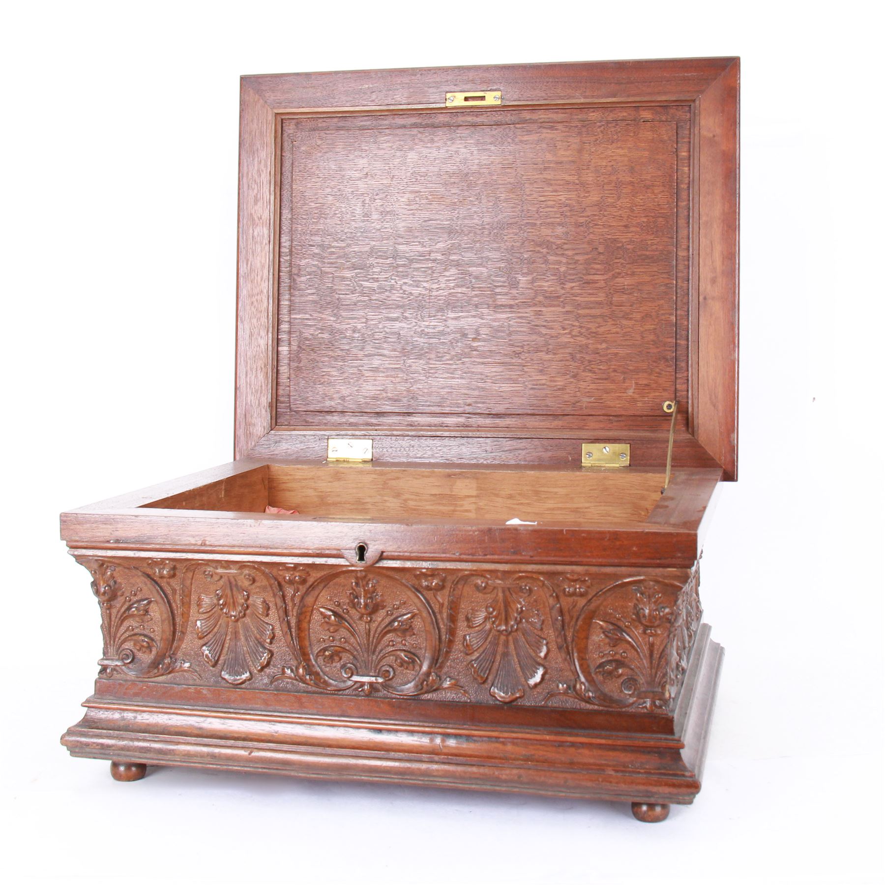 19th century Continental mahogany and oak box, carved in high relief with classical figures, harp, musical trophies, anthemion and foliate motifs, H22.5cm L48cm D38.5cm