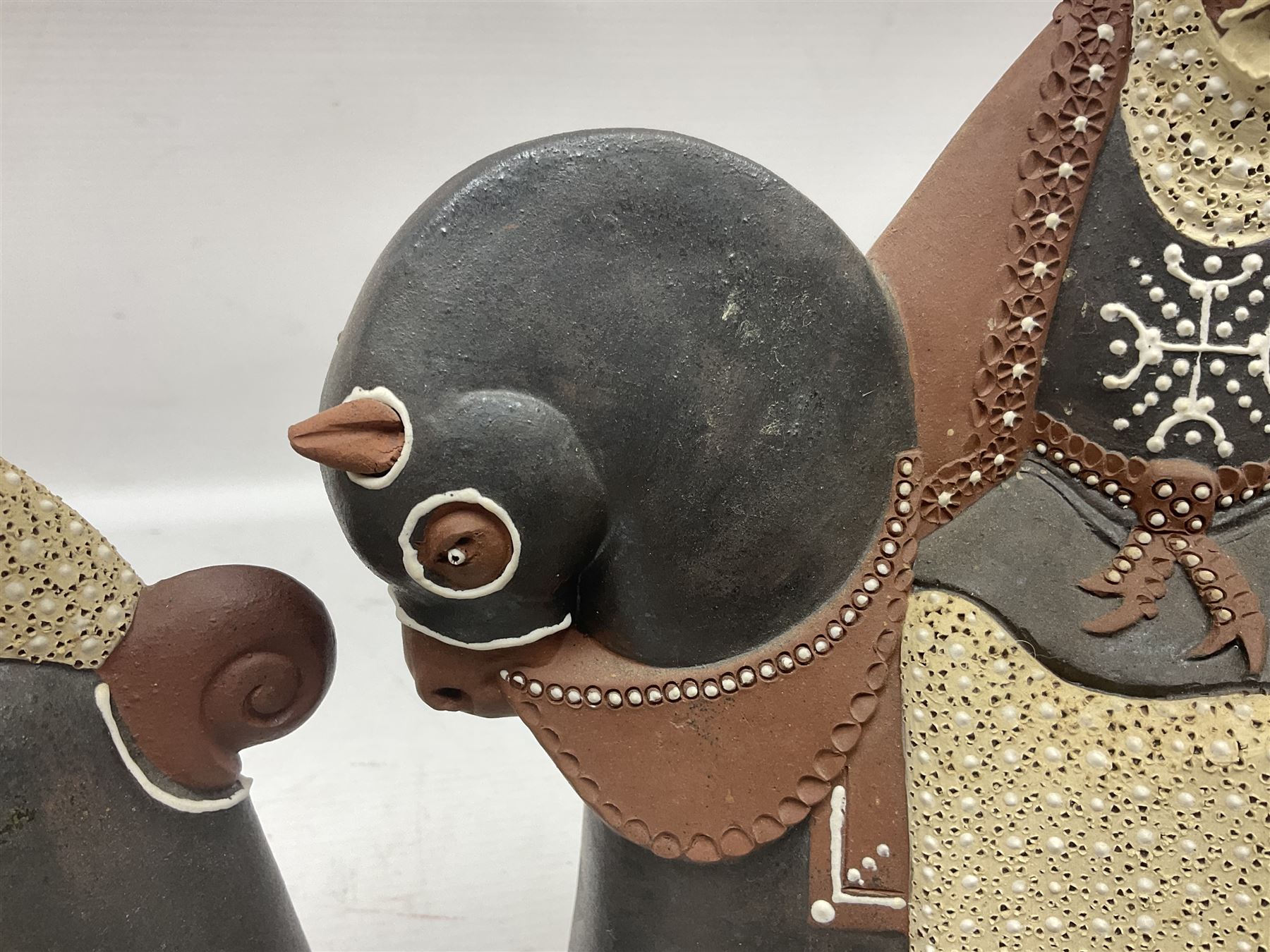 Leonard Stockley; two studio pottery figures modelled as a king and queen upon horses, both signed beneath,  H25cm