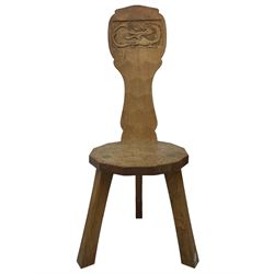 Gnomeman - two oak spinning or hall chairs, shaped splat backs, one carved with Yorkshire Rose, the other with mythical dragon, decagon seats on chamfered square tapering supports, each carved with gnome signature, by Thomas Whittaker, Littlebeck