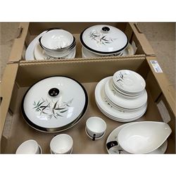 Royal Doulton dinner and tea wares, decorated in the bamboo pattern, to include dinner plates, dessert plates, side plates, pair of lidded tureens, sauce boat, serving plates, coffee cups, etc., in two boxes