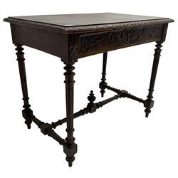 19th century walnut side table,  rectangular top with lunette carved moulded edge, the frieze drawer carved with ribbon and extending vine branch and grapes, on turned and fluted supports united by fluted stretcher with centre finial 