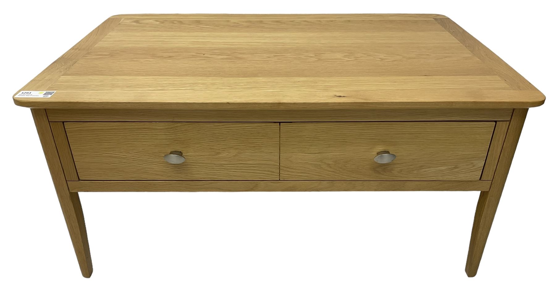 Contemporary light oak rectangular coffee table, fitted with single drawer disguised as two drawers to each side, on tapering supports