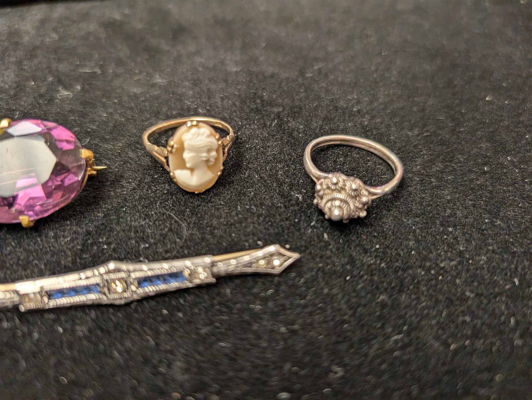 9ct gold cameo ring, silver paste set brooch, gold stone set stick pin. paste brooch and one other ring