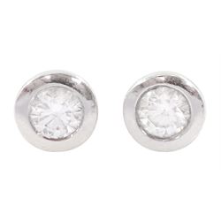 Pair of 9ct white gold bezel set round brilliant cut diamond stud earrings, hallmarked, total diamond weight approx 0.40 carat