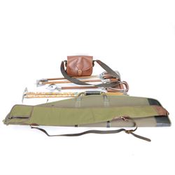 Hicks & Hides, brown leather cartridge bag on a canvas strap, together with two gun sleeve...