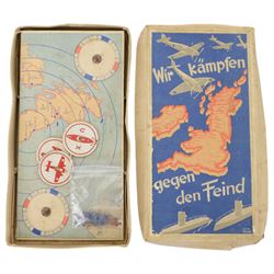 WWII German board game, Wir Kampfen gegen den Feind, Goebel Spiele, 1940, color-printed, foldable game board: British Isles with concentric distance circles, 3 rotating discs, fifteen game pieces (comprising three submarines, seven bombers and five fighter planes), in original box
