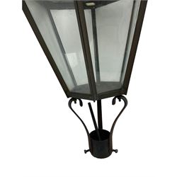 Victorian design six glass lantern, hexagonal tapered from with finial, scrolled lower supports on bracket