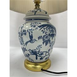 Table lamp of baluster form, decorated with exotic birds up fruiting trees, on gilt chrome pedestal, including shade H554cm