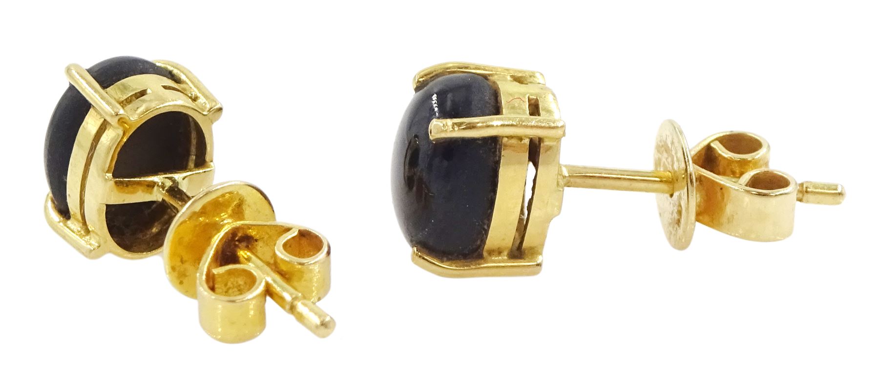 Pair of gold black / brown star sapphire stud earrings