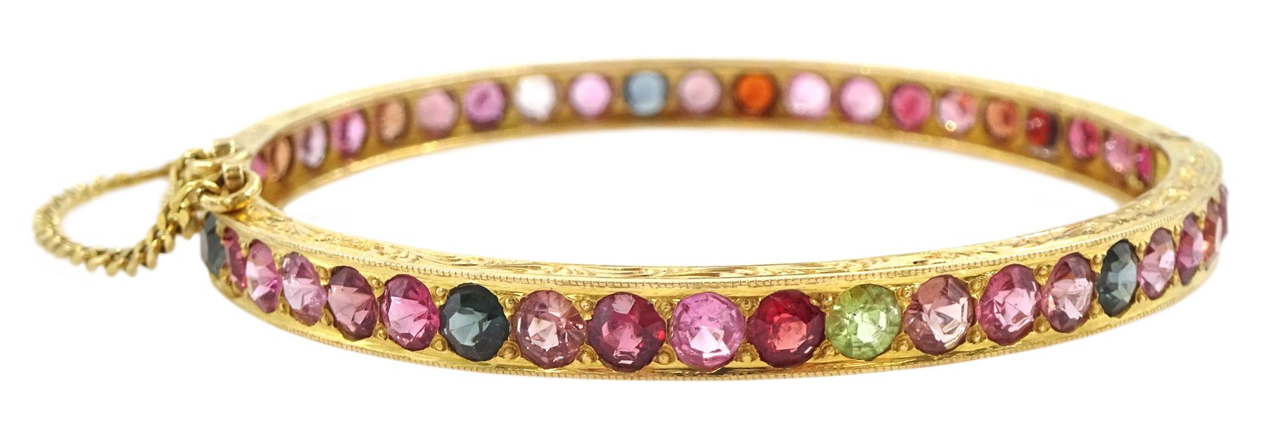 19ct gold multi gemstone hinged bangle, including topaz and tourmaline, the sides with bright cut decoration