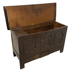 18th century oak mule chest, rectangular hinged top with moulded edge enclosing candle box, the triple panelled front with geometric fielded mouldings, fitted with single drawer to base, raised on stile feet