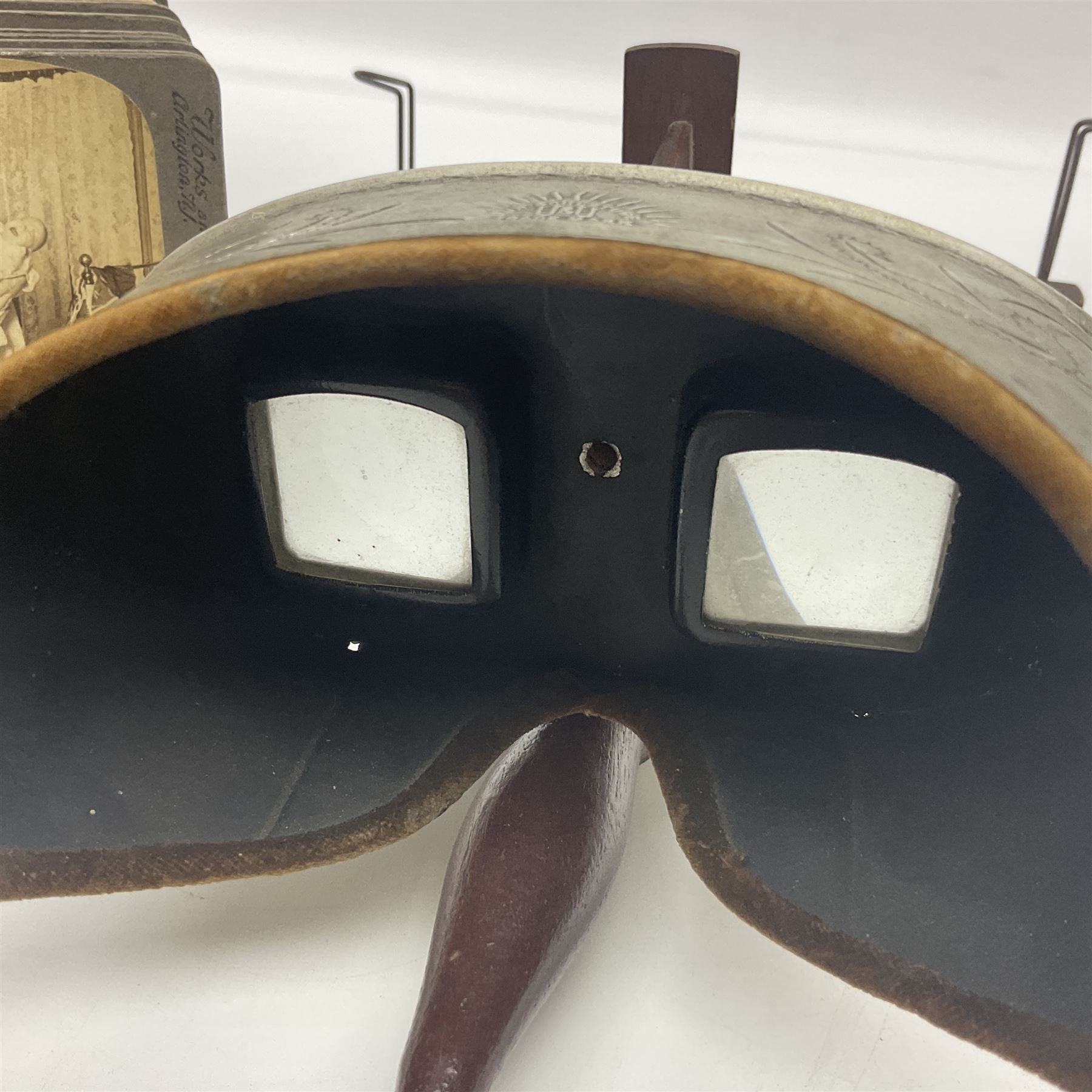 Underwood & Underwood sun sculpture stereoscope viewer, together with stereoscopic views by Underwood and Underwood 