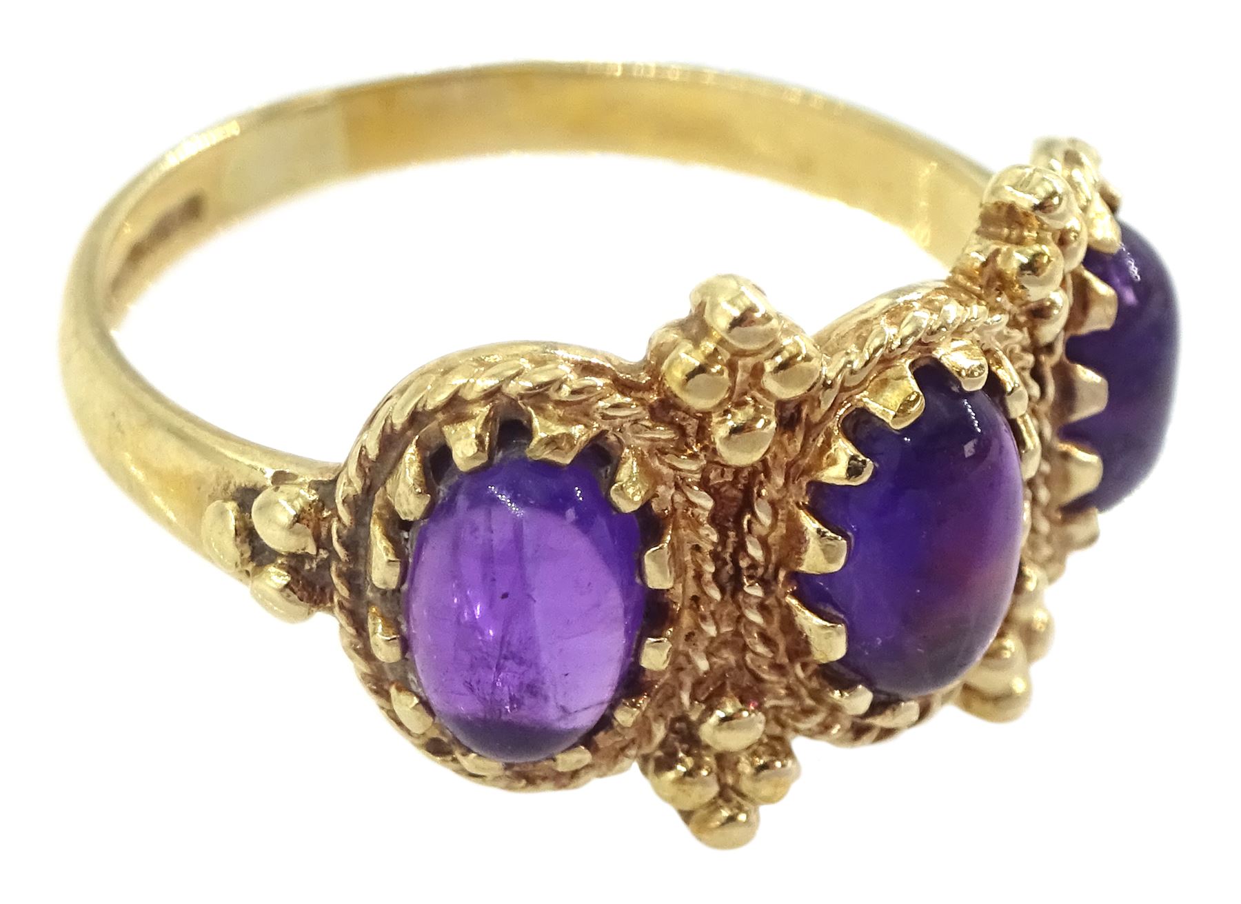 9ct gold three stone cabochon amethyst ring, hallmarked