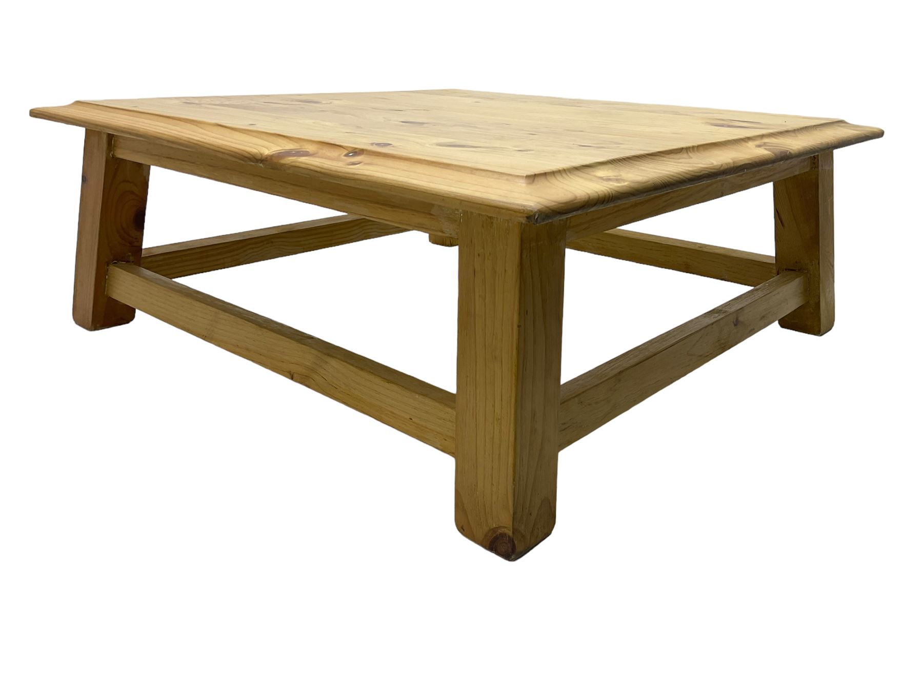 Pine coffee table, moulded top square top raised on splayed supports united by box stretchers 