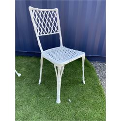Set four Victorian style white painted cast metal garden chairs, and an additional white painted cast metal chair  - THIS LOT IS TO BE COLLECTED BY APPOINTMENT FROM DUGGLEBY STORAGE, GREAT HILL, EASTFIELD, SCARBOROUGH, YO11 3TX