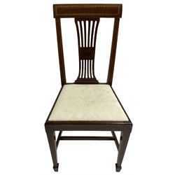 Set of four (2+2_ Edwardian inlaid mahogany dining chairs, cresting rail with satinwood banding, pierced splat backs with central inlay, drop-in seats upholstered in foliate patterned ivory fabric, raised on square tapering supports terminating in spade feet