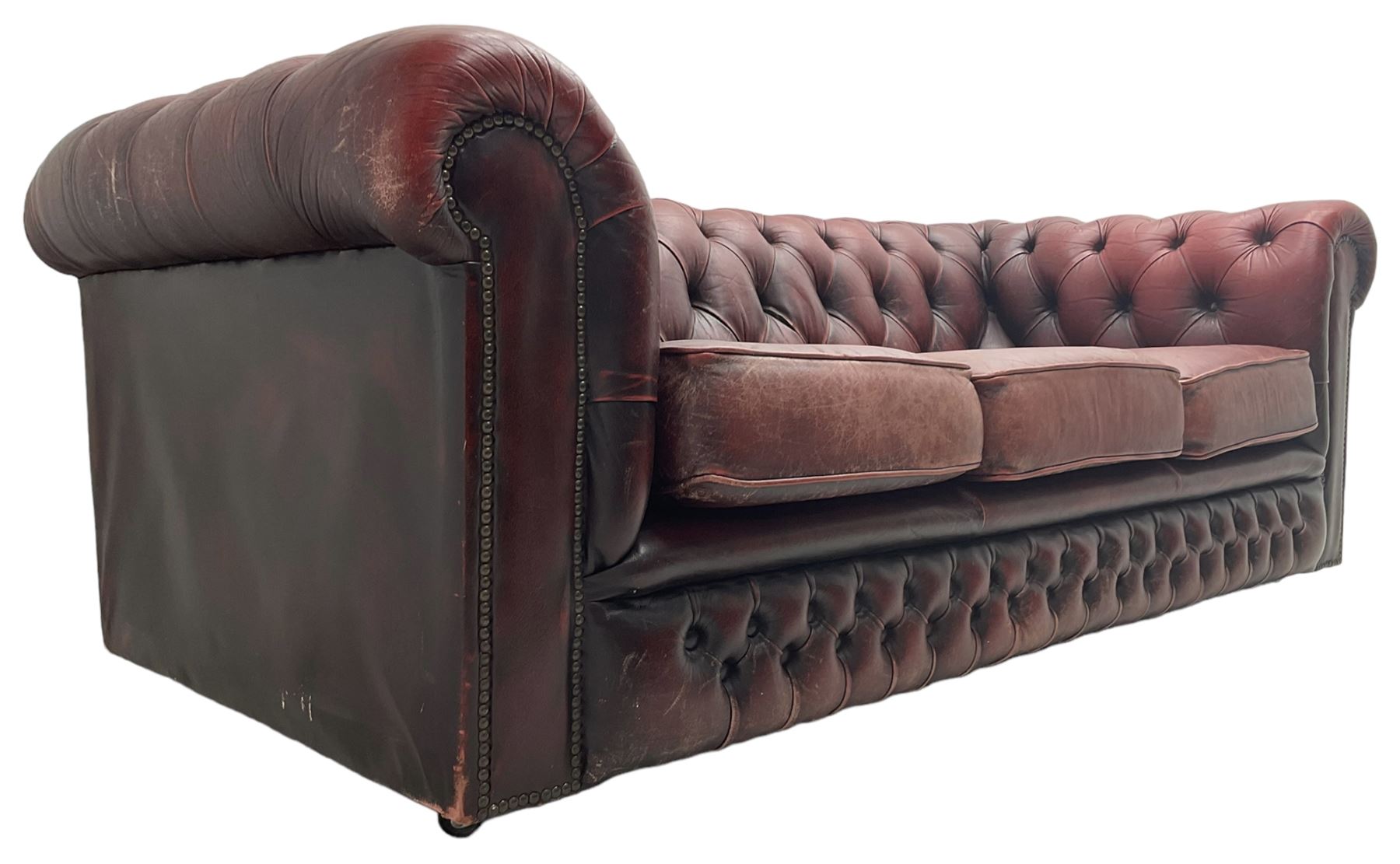 Chesterfield three-seat sofa upholstered in red buttoned leather