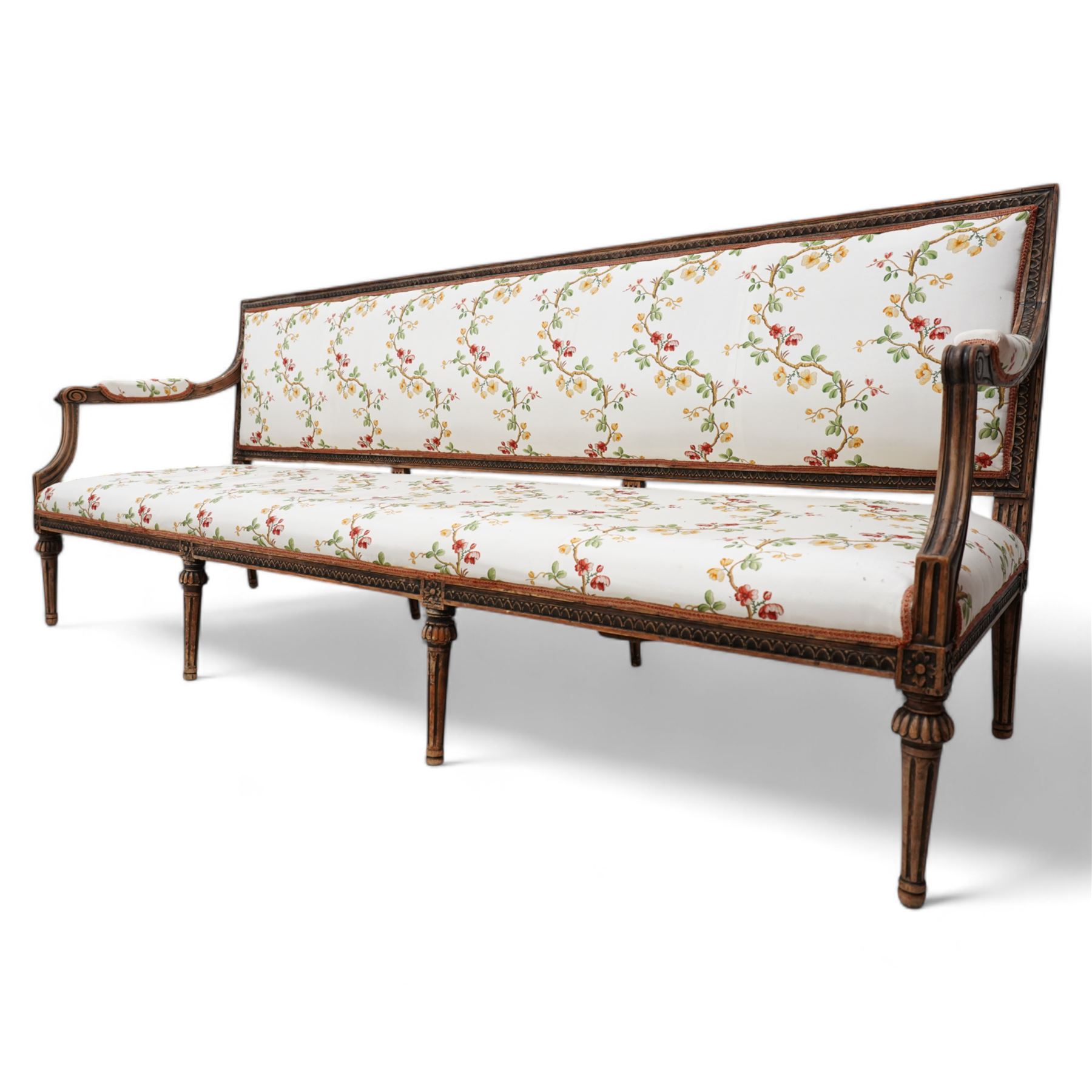 Late 19th century Swedish beech-framed settee, upholstered in cream fabric with trailing foliate pattern decorated with flowers, carved and moulded frame, scroll carved arm terminals on shaped moulded arm supports, on turned and fluted feet