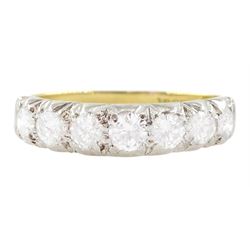 White and yellow gold seven stone round brilliant cut diamond half eternity ring, stamped ...