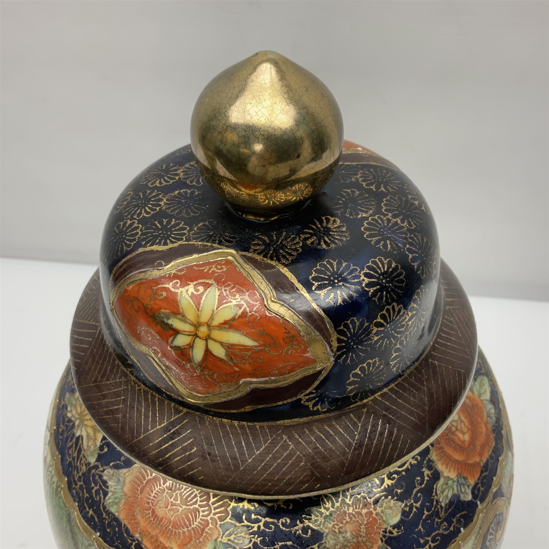 Pair of Chinese Satsuma baluster shaped lidded vases, decorated with birds perched amongst peonies, H36cm 