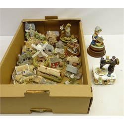 Seventeen Lilliput Lane models including 'Chiltern Mill', 'Secret Garden', 'The Briary' and others, two similar models, Leonardo Otter group, Reuge music box with porcelain figure and another   